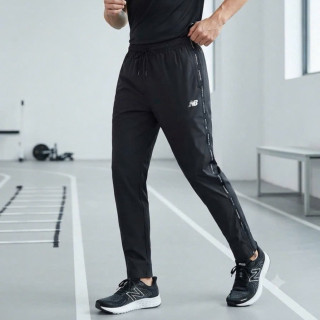 NEW BALANCE NB 運動休閒長褲 側邊logo串標