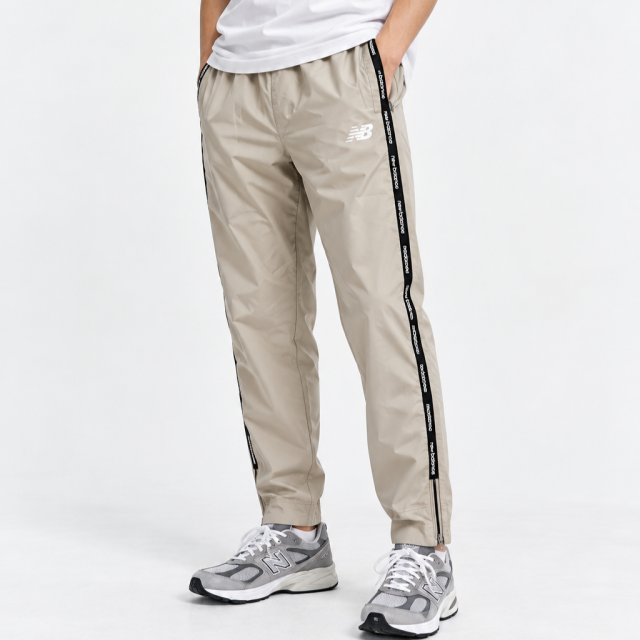 NEW BALANCE NB 運動休閒長褲 側邊logo串標